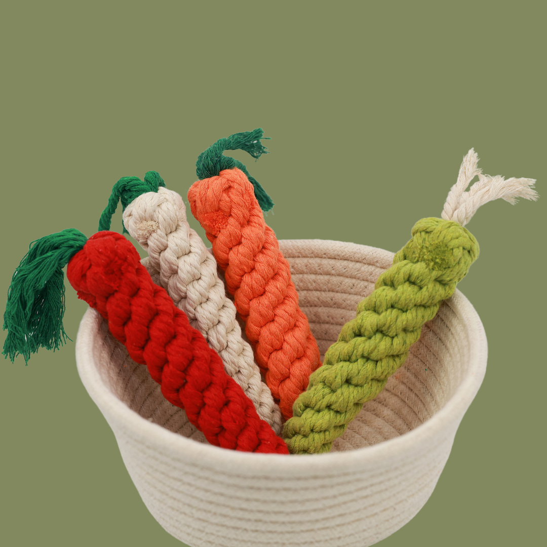 Handwoven carrot-shaped pet toy made of durable cotton rope. Ideal for chewing and playing, it promotes dental health and provides hours of fun for your furry friend.