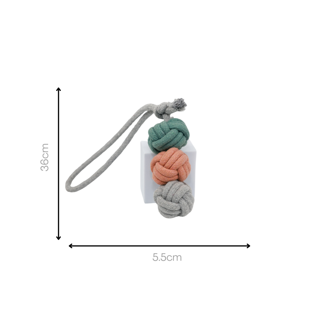 Handcrafted pet toy made of durable cotton rope, designed as a triple ball for interactive play and chewing. Perfect for keeping your pet engaged and happy.
