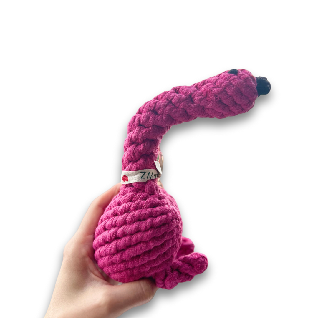 Handmade Eco-Friendly Flamingo Rope Dog Toy - A vibrant, eco-friendly rope toy shaped like a flamingo. Made from sustainable materials, this durable toy is perfect for chewing, tugging, and interactive play, offering fun and environmental responsibility for your pet.