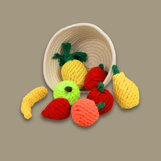 Colorful fruit-themed woven pet toy collection, perfect for playful pets. Includes durable, handmade toys shaped like strawberries, bananas, and pineapples, ensuring hours of fun and exercise for your furry friends.