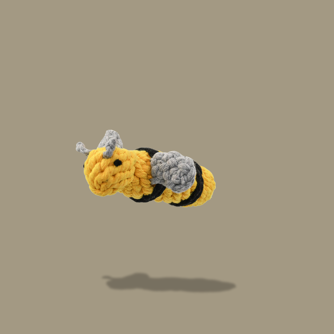 Bee-shaped cotton rope woven pet toy, perfect for chewing and playing. Durable and safe for pets, providing hours of entertainment and promoting dental health.