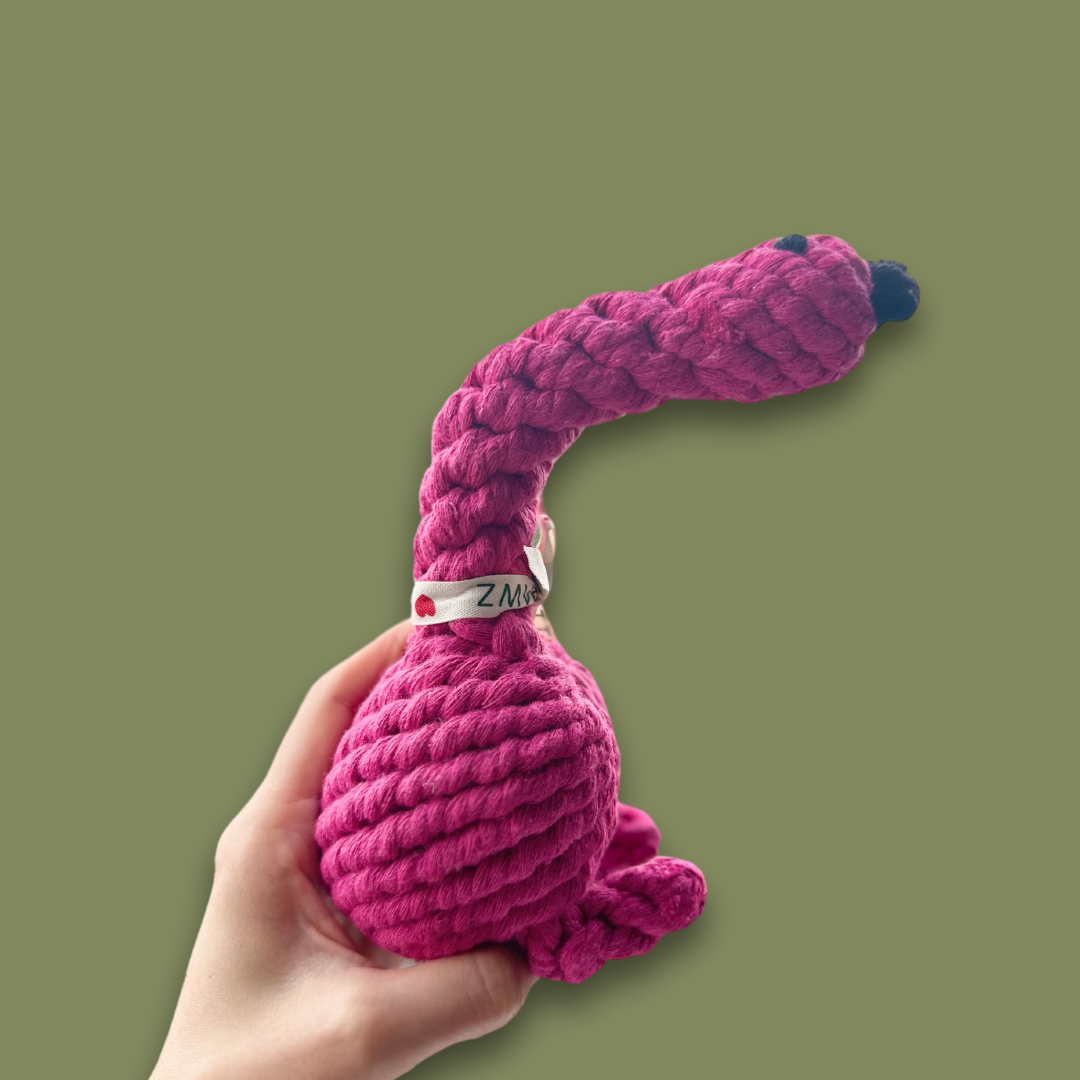 Sustainable Flamingo Rope Dog Toy - A durable, eco-friendly dog toy shaped like a flamingo, made from sustainable materials. Perfect for chewing, tugging, and interactive play, this toy offers fun while being kind to the environment.