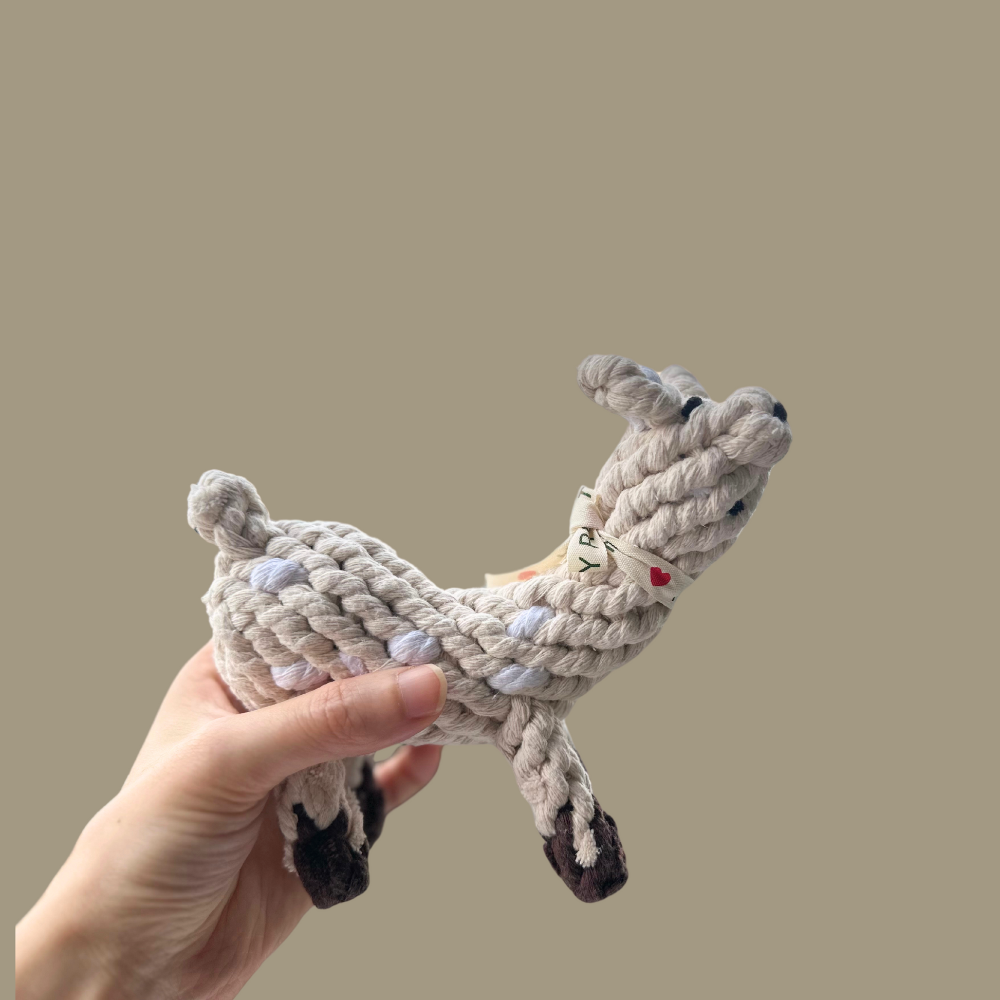 Wooly Llama Play Rope Durable Cotton Pet Toy - A sturdy, llama-shaped rope toy made from durable cotton. Perfect for chewing, tugging, and interactive play, this toy offers long-lasting fun and engagement for your pet.